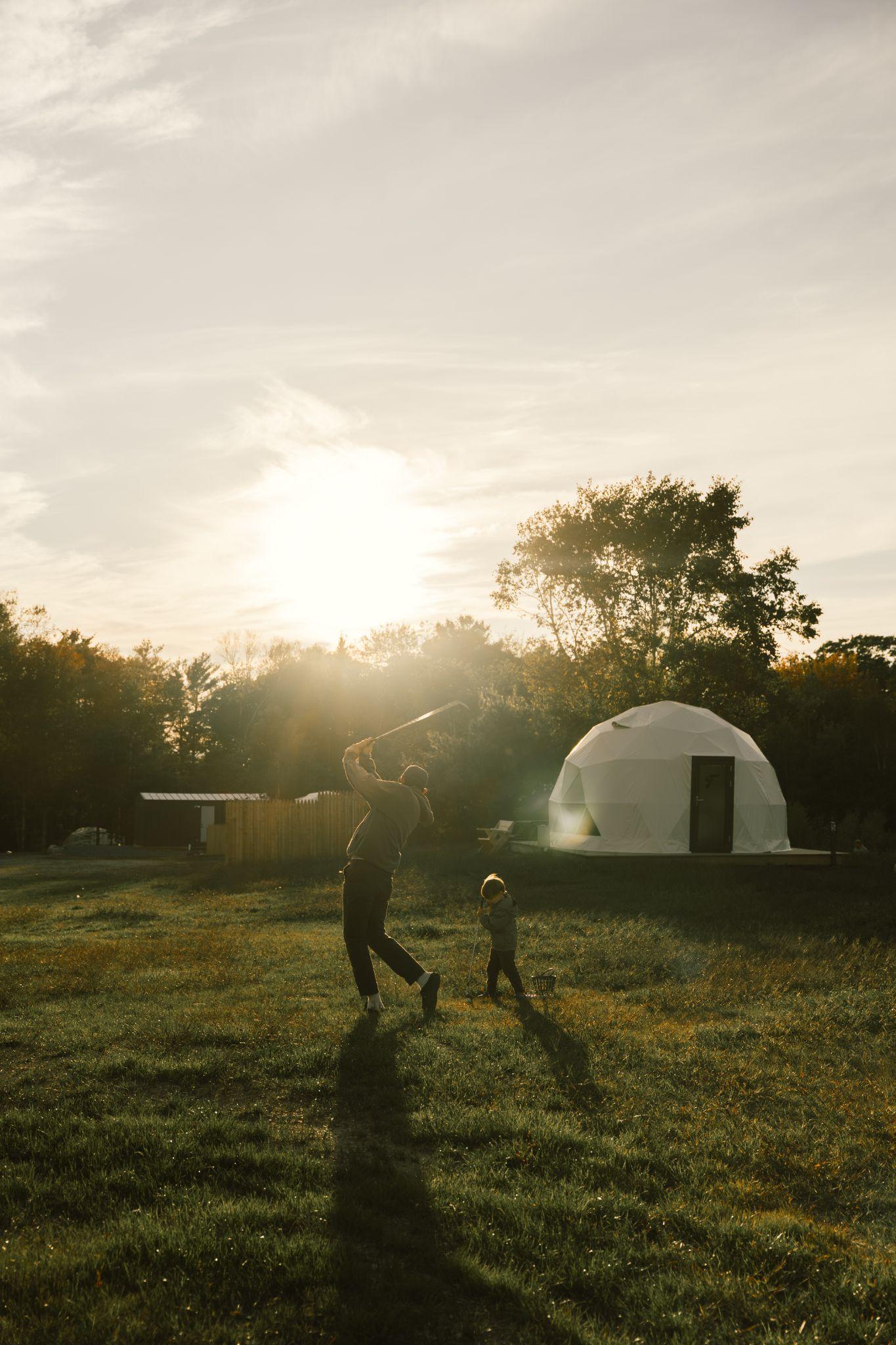Lifestyle view of a glamping dome at sunset