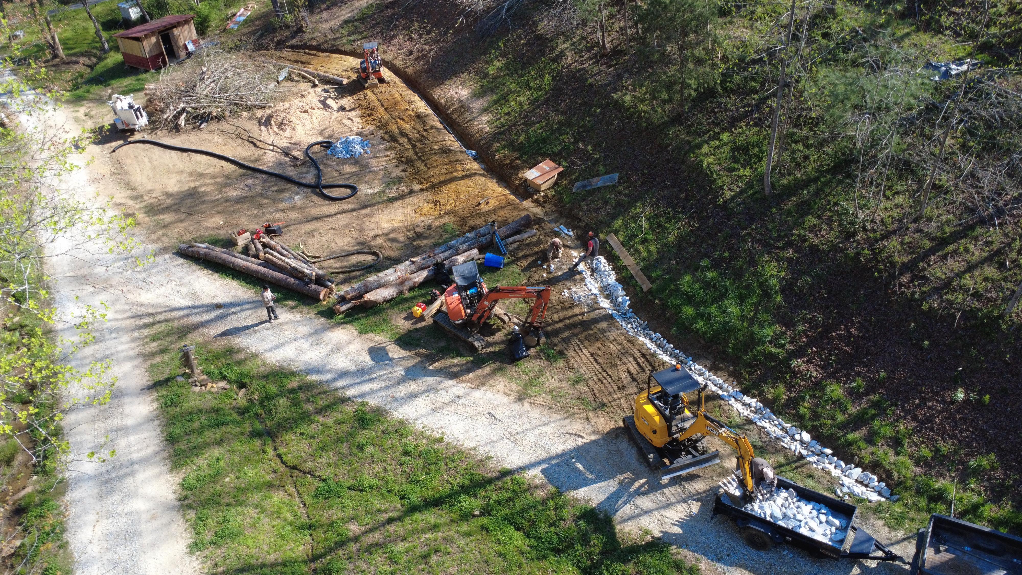 Aerial view of grading with existing canopy cove tents